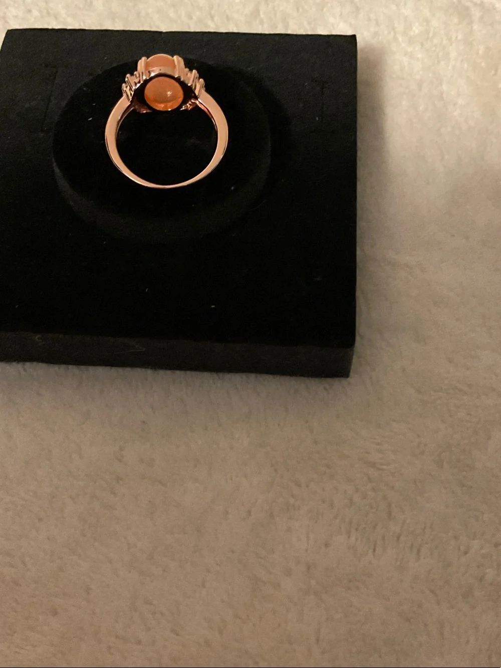 Gold-Tone Ring with Orange Opal Center and Clear Accent Stones